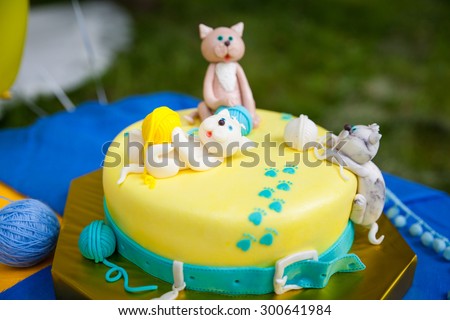 Birthday Cake with kittens playing with yellow and and turquoise yarn balls