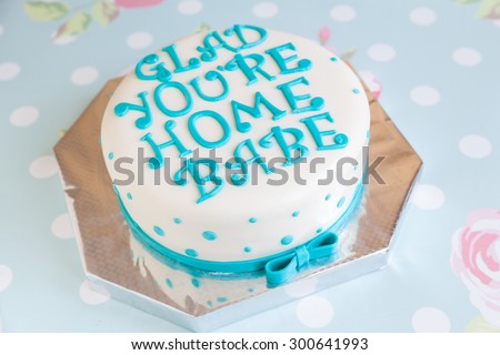 Birthday Cake with blue dots and mastic text \