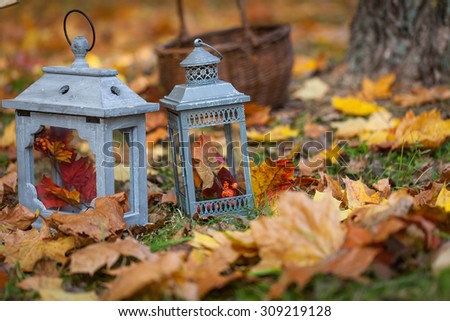 Autumn garden decor with lanterns
