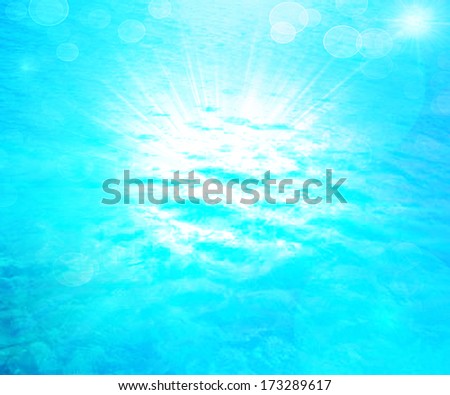 An image of a beautiful blue sea and sun background