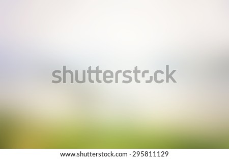 Abstract blurred textured background: yellow orange and green patterns. Blurred nature background. Beautiful oceans and bright sun light. Summer Holidays, World Environment, Earth Day concept.