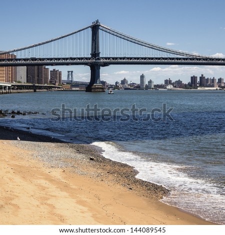 East River Beach - Low tide reveals a beach on the Manhattan side of the East River.