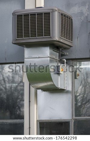 Industrial airconditioning unit seen outside small factory unit.