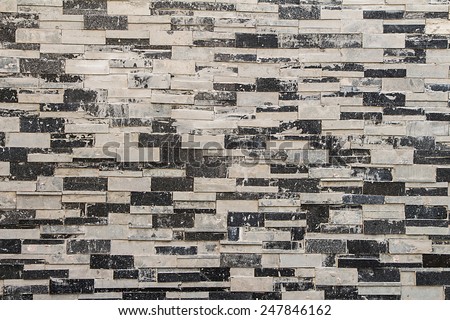 Background of a wall made of granite cut and paste it forward, vintage style