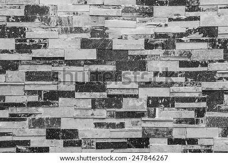 Background of a wall made of granite cut and paste it forward, vintage style