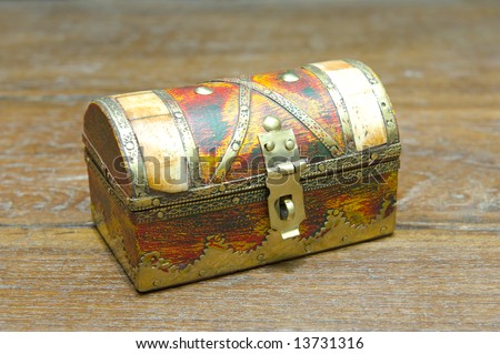 Beautiful renovated small antique jewelery box made of wood with copper and ivory inlays.