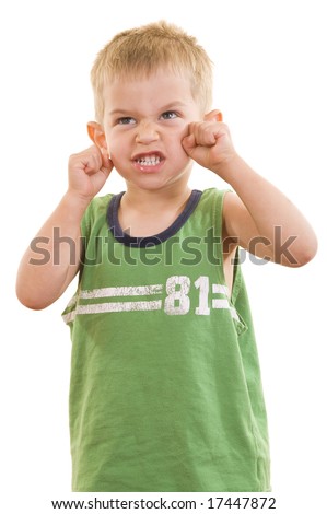 A gorgeous little cute three year old boy doing an angry facial expression, isolated on white.