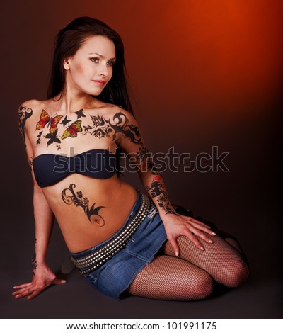 Young woman with body art .
