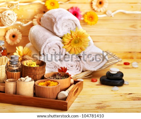 Spa still life  with towel and flower in wood spa.
