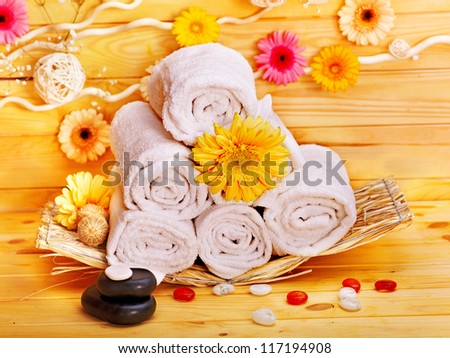 Spa still life  with towel and stone in wood spa.
