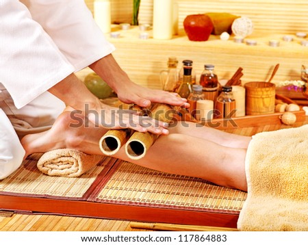 Woman getting feet massage Male therapist.