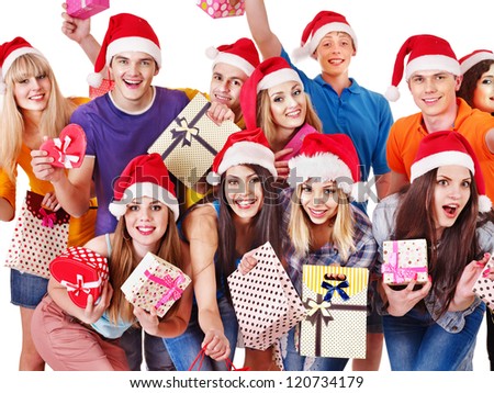 Group people in Santa hat holding gift box .