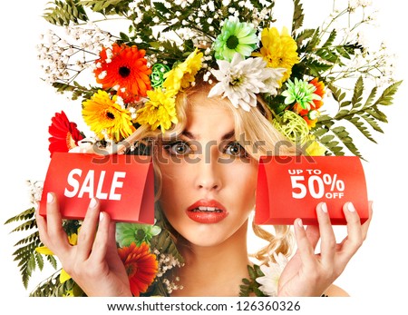 Woman holding sale banner and flower. Isolated.
