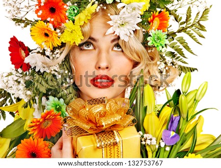 Woman with gift box and flower. Isolated.