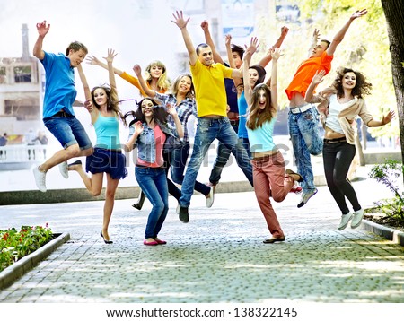 Group Happy People In Summer Outdoor.