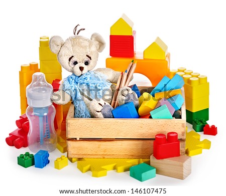 Children toys with teddy bear and cubes. Isolated.