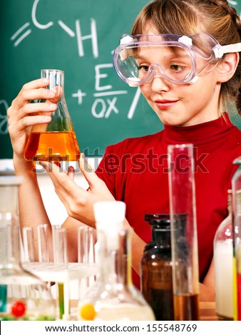 Child Holding Flask In Chemistry Class.