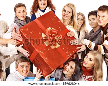 Group people holding red big gift box. Isolated.