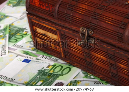 Ancient box on euro banknote.