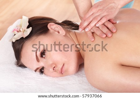 Beautiful young white woman  having thai massage.