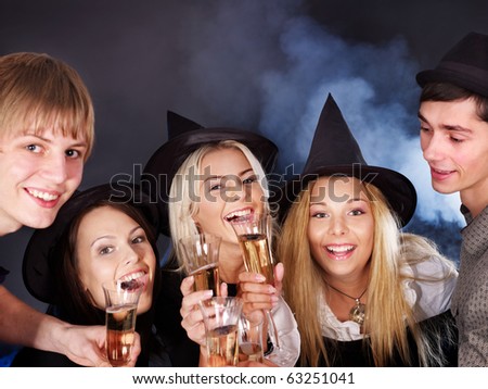 Group young people drinking champagne at nightclub.
