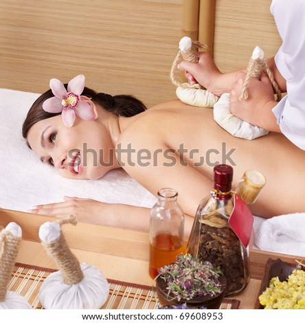 Young beautiful woman on massage table in beauty spa. Series.