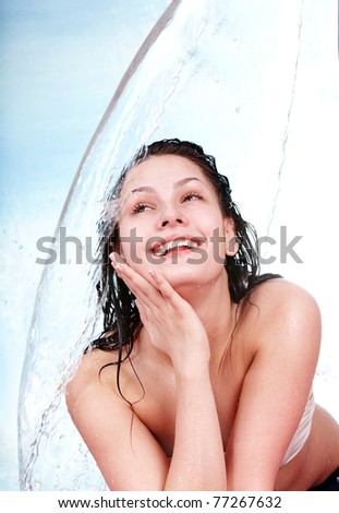 Beautiful  girl in water. Body care. Isolated.