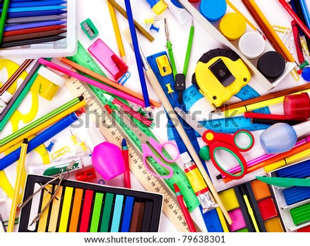 Background of group school supplies.