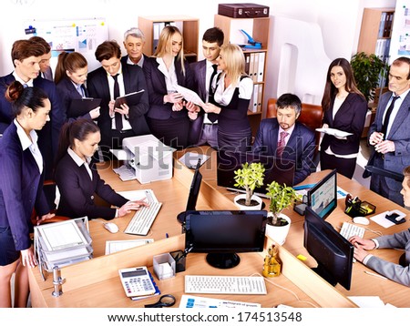 Happy group business people in office.