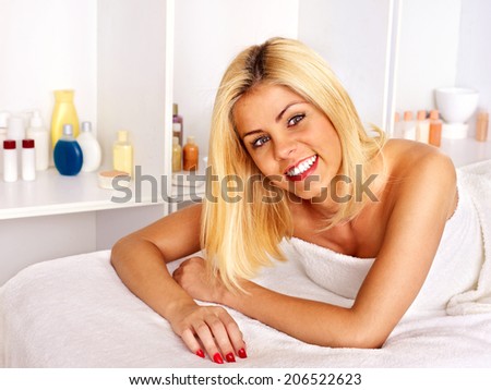 Blond smiling woman  in health resort.