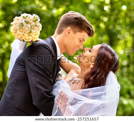Bride and groom with flower summer  outdoor. Wedding outdoor.