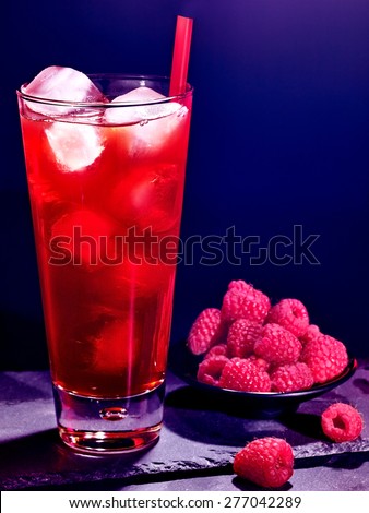 Red raspberry drink  with ice cube on black background. Cocktail card 44