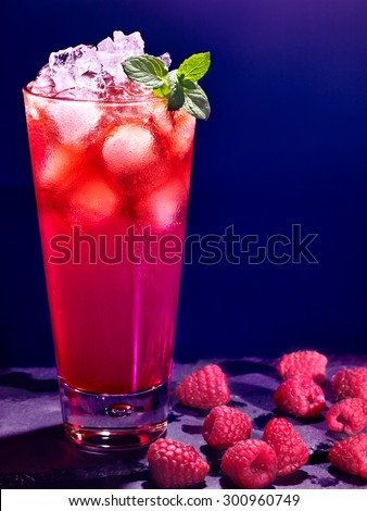 Red raspberry drink  with ice mint cube on black background. Cocktail card 78.
