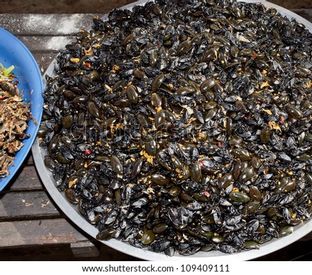 fried insects with garlic and chillie cambodia asia food travel