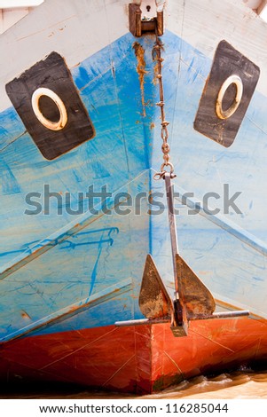 front of vietnamese boat showing a face pattern