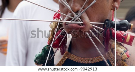 piercing by monk at the phuket religious festival phuket thailand