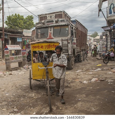 SUNAULI, INDIA - CIRCA SEPTEMBER 2013: rickshaw is a popular means of public transport in India circa September 2013 in Sunauli.