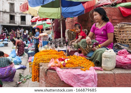 KATHMANDU, NEPAL - CIRCA OCTOBER 2013: street trading is the basic form of selling in Nepal circa October 2013 in Kathmandu.