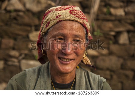 BUPSA, NEPAL - CIRCA OCTOBER 2013: Nepalese woman circa October 2013 in Bupsa.