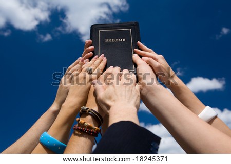 Bible In Hand On Background Blue Sky Stock Photo 18245371 : Shutterstock