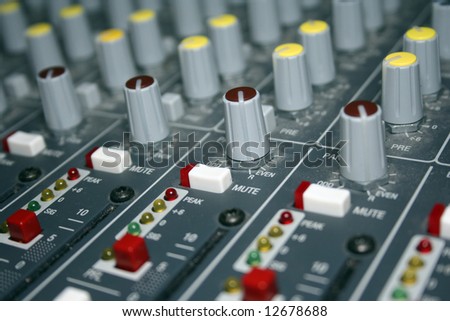 A large mixing board used for live music or in a recording studio