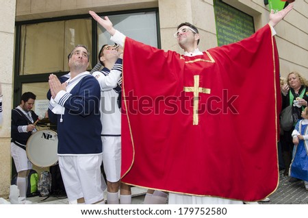 CADIZ, SPAIN-MARCH 02: men dressed members of the Catholic Church in carnival parade Cadiz on march 02, 2014 in CaÂ¡diz