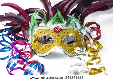 Carnival Masks and serpentine in white background