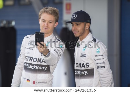 JEREZ DE LA FRONTERA, SPAIN - FEBRUARY 01: Nico Rosberg and Lewis Hamilton, pilots of the team Mercedes, are made a selfie in test Formula 1 in Circuito de Jerez on feb 01, 2015 in Jerez.