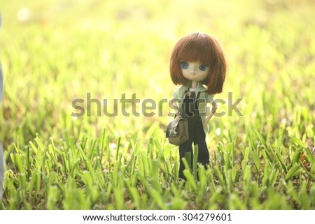 plastic doll , little girl in the garden ,vintage girl doll , vintage toy