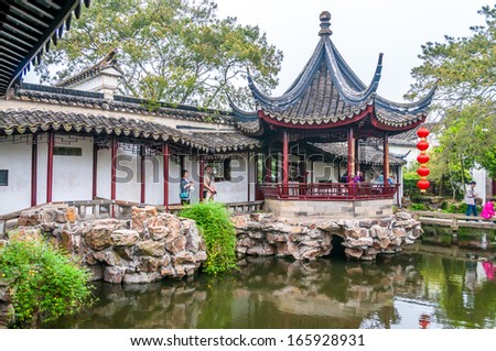 Suzhou, China - April 30,2012 - Garden In Suzhou. These Gardens, Most Of Them Built By Scholars, Standardized Many Of The Key Features Of Classical Chinese Garden Design.