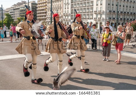 ATHENS, GREECE - SEPTEMBER 1,2009 - Changing of the Guard at The Syntagma Square.The Square is located near many of Athens\' oldest and most famous neighborhoods and tourist attractions.