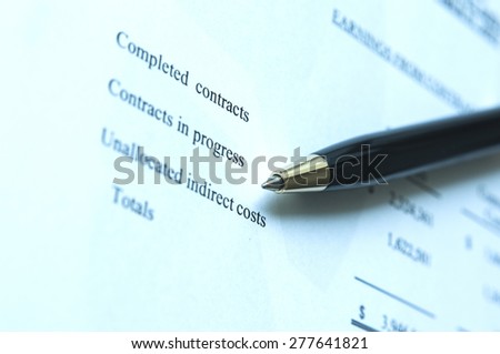 Pen and financial statement background