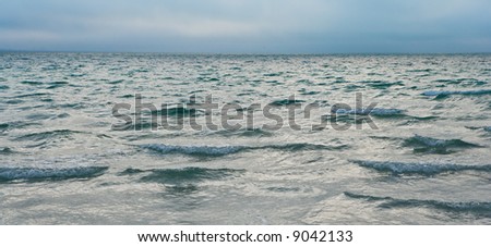 Gentle waves out to the horizon on the Atlantic Ocean