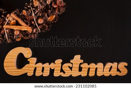 Christmas frame for greeting card with decorative wreath. black background
